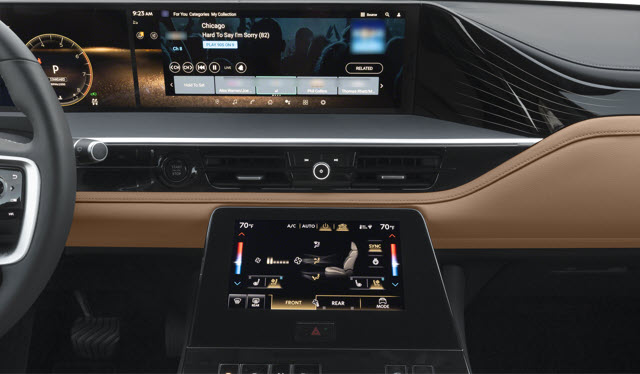 Modern 2026 INFINITI QX80 dashboard with touchscreen controls and digital displays showing climate and navigation settings.